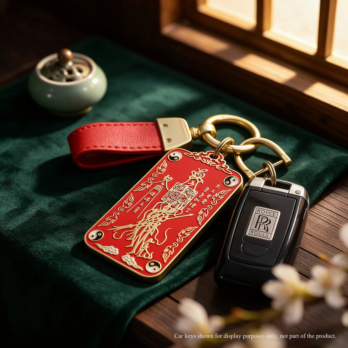 Taoist Five Thunder red enamel talisman keychain with Yin-Yang emblem, side view